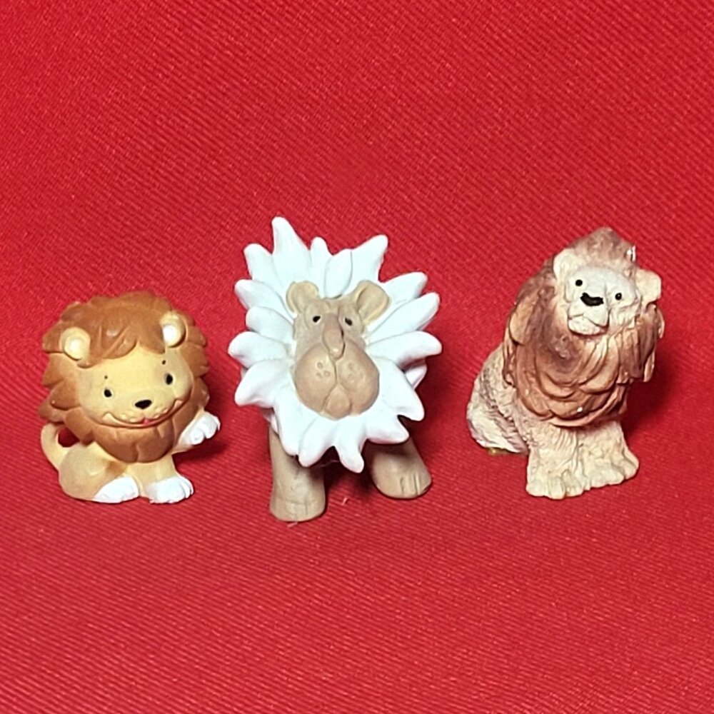 Three Miniature Lion Figurines